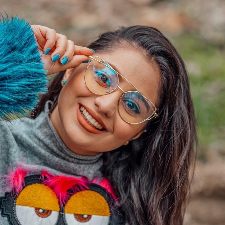 Alex Carter, Lead Design Curator at BridgeParagonNode, reviewing corporate floral arrangements